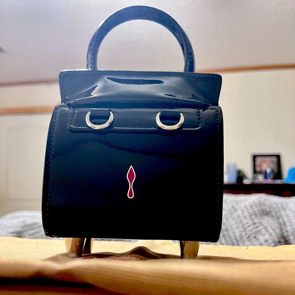 Christian Louboutin Paloma nano black and red. Small enough for concerts, etc.